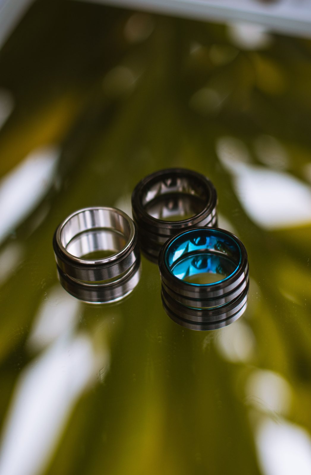 An Oura ring and quiet trackers, measuring rest and recovery.